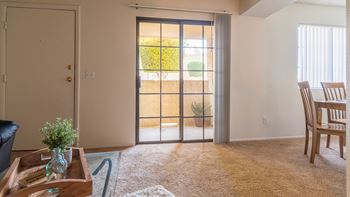 El Encanto glass sliding doors to private balcony. 